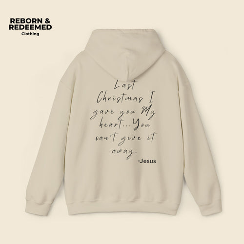 Beige hoodie with text on the back on a beige background, featuring the brand 'Reborn & Redeemed'. | Sand